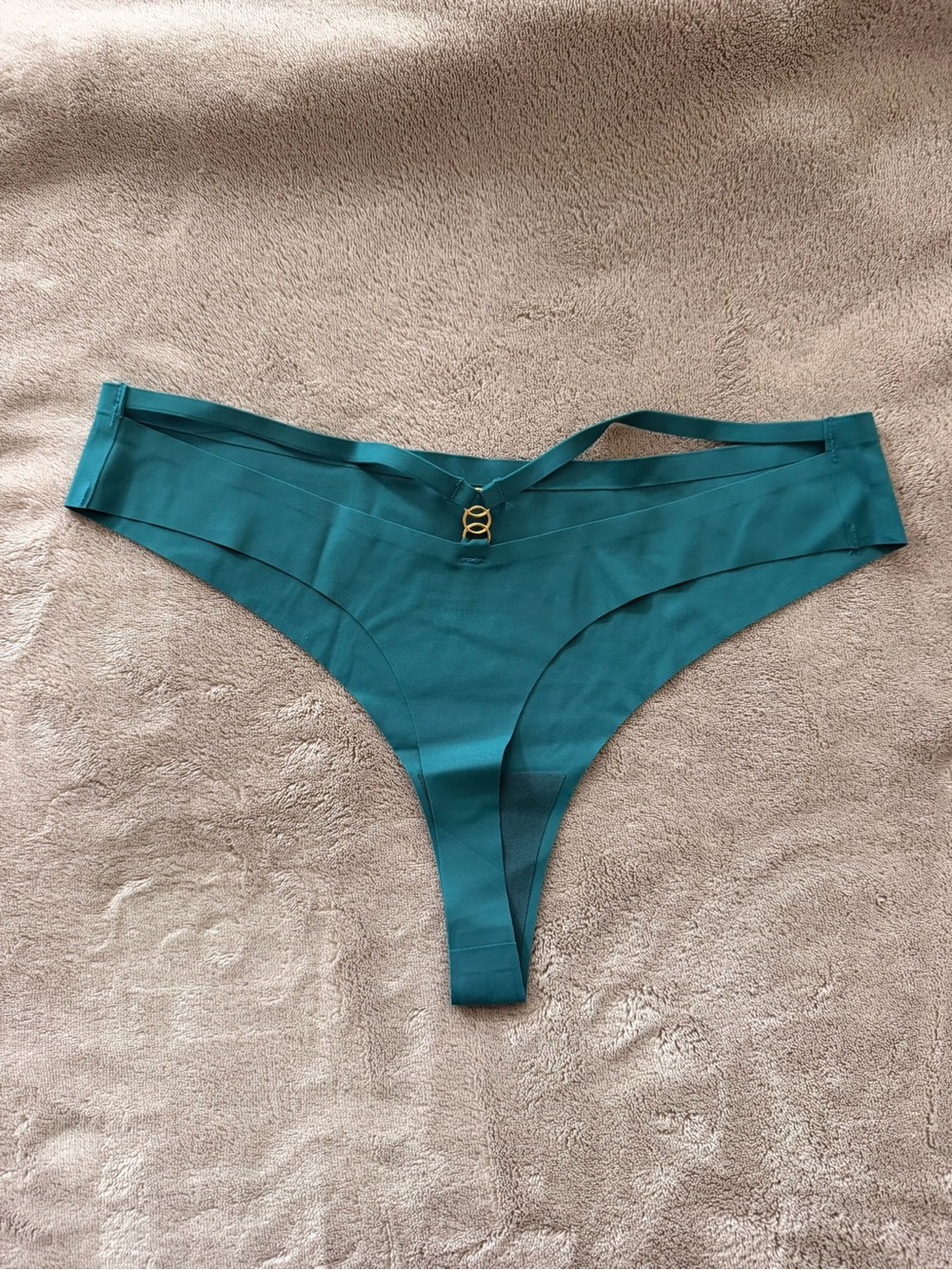 Sexy and chic teal metal decorated thong, size M